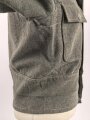Heer, Feldbluse für Mannschaften Modell 1944. Getragenes Stück , die Effekten original vernäht