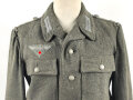 Heer, Feldbluse für Mannschaften Modell 1944. Getragenes Stück , die Effekten original vernäht