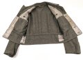Heer, Feldbluse für Mannschaften Modell 1944. Getragenes Stück , die Effekten original vernäht