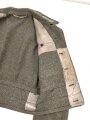 Heer, Feldbluse für Mannschaften Modell 1944. Getragenes Stück , die Effekten original vernäht