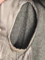 Heer, Feldbluse für Mannschaften Modell 1944. Getragenes Stück , die Effekten original vernäht
