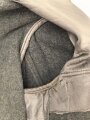 Heer, Feldbluse für Mannschaften Modell 1944. Getragenes Stück , die Effekten original vernäht
