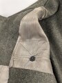 Heer, Feldbluse für Mannschaften Modell 1944. Getragenes Stück , die Effekten original vernäht