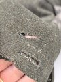 Heer, Feldbluse für Mannschaften Modell 1944. Getragenes Stück , die Effekten original vernäht