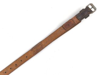 Tornisterriemen Luftwaffe, schokoladenbraunes Leder, Leichtmetallbeschläge. Herstellerstemepl von 1939. Ungebraucht