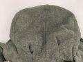 Schwerer Wintermantel für Angehörige der Waffen SS ( keine Ärmelaufschläge, Querriegel hinten durchgehend)  Getragenes Stück in gutem Zustand