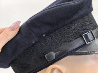 Deutsche Arbeitsfront Schirmmütze. getragenes Stück, guter Gesamtzustand, im Schweißband mit RZM Etikett. Kopfgrösse 56