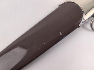 Dienstdolch Modell 1933 für Angehörige der SA. Späte Fertigung RZM M7/36 für E. & F. Hörster, Solingen. Zusammengehöriges Stück in gutem Gesamtzustand