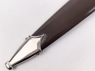 Dienstdolch Modell 1933 für Angehörige der SA. Späte Fertigung RZM M7/36 für E. & F. Hörster, Solingen. Zusammengehöriges Stück in gutem Gesamtzustand