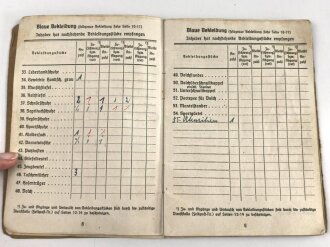 Soldbuch Kriegsmarine, ausgestellt am 6.12.1943. Ausgegebener Stahlhelm, Nachrichten Ersatz Abteilung 6, Flakausbildungskompanie Schillig, an 10.7.44 Unterseebootslehrdivision.