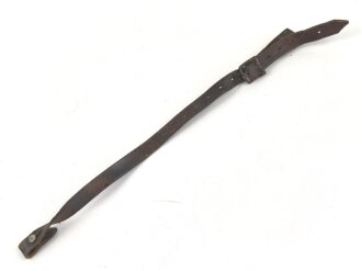 Kinnriemen für einen Stahlhelm der Wehrmacht. Datiert 1940, defekt, Klebstoffreste