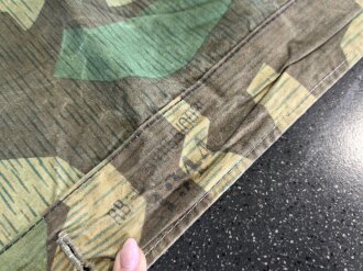 Zeltbahn 31 Wehrmacht. Leicht getragenes Stück mit Reichsbetriebsnummer , Kontrastreiches Stück , datiert 1944