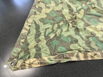 Zeltbahn 31 Wehrmacht. Leicht getragenes Stück mit Reichsbetriebsnummer , Kontrastreiches Stück , datiert 1944
