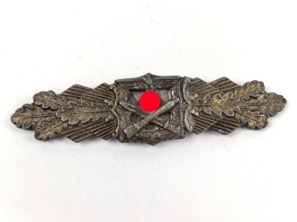 Nahkampfspange in bronze, Hersteller Juncker. War mal gebrochen, Klebstoffreste