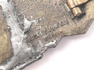 Nahkampfspange in bronze, Hersteller Juncker. War mal gebrochen, Klebstoffreste
