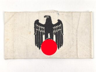 Armbinde für Zivilangestellte der Wehrmacht, dazu ein Foto