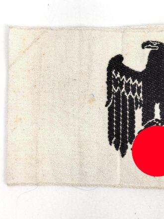 Armbinde für Zivilangestellte der Wehrmacht, dazu ein Foto
