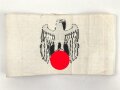 Armbinde für Zivilangestellte der Wehrmacht, dazu ein Foto