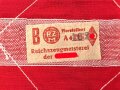 Armbinde für Angehörige der Hitler Jugend. getragenes Stück, das Hakenkreuz gewebt. Leicht angeschmutzt, sonst gut. RZM Etikett
