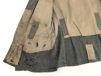 Heer, Feldbluse für Mannschaften Modell 1943. Stark getragenes Stück, die Kragenspiegel original vernäht