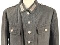 Heer, Feldbluse für Mannschaften Modell 1943. Stark getragenes Stück, die Kragenspiegel original vernäht