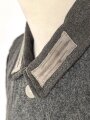 Heer, Feldbluse für Mannschaften Modell 1943. Stark getragenes Stück, die Kragenspiegel original vernäht