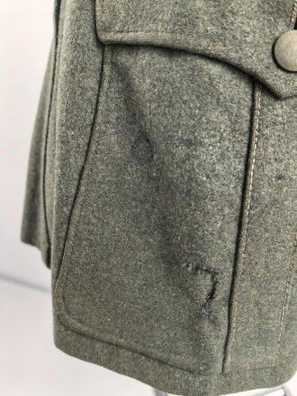 Heer, Feldbluse für Mannschaften Modell 1936. Getragenes Stück, die Effekten höchstwahrscheinlich original vernäht.