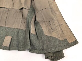 Heer, Feldbluse für Mannschaften Modell 1936. Getragenes Stück, die Effekten höchstwahrscheinlich original vernäht.