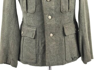 Heer, Feldbluse für Mannschaften Modell 1936. Getragenes Stück, die Effekten höchstwahrscheinlich original vernäht.