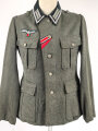 Heer, Feldbluse für Mannschaften Modell 1936. Getragenes Stück, die Effekten höchstwahrscheinlich original vernäht.