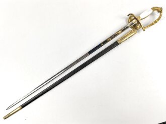 Bayern, Degen für Staatsbeamte. Ausführung mit gekröntem Monogramm " M " für König Maximilian II. (1848-1864) . Die Klinge beidseitig gebläut, leicht verputzt. Hersteller "R.Knecht in Solingen "