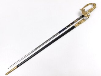 Bayern, Degen für Staatsbeamte. Ausführung mit gekröntem Monogramm " M " für König Maximilian II. (1848-1864) . Die Klinge beidseitig gebläut, leicht verputzt. Hersteller "R.Knecht in Solingen "
