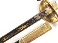 Bayern, Degen für Staatsbeamte. Ausführung mit gekröntem Monogramm " M " für König Maximilian II. (1848-1864) . Die Klinge beidseitig gebläut, leicht verputzt. Hersteller "R.Knecht in Solingen "