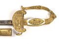 Bayern, Degen für Staatsbeamte. Ausführung mit gekröntem Monogramm " M " für König Maximilian II. (1848-1864) . Die Klinge beidseitig gebläut, leicht verputzt. Hersteller "R.Knecht in Solingen "