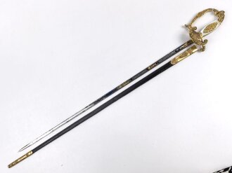 Bayern, Degen für Staatsbeamte. Ausführung mit gekröntem Monogramm " M "  . Die beidseitig gebläute Klinge allem Anschein nach älter, das Griffmonogramm bei Herrscherwechsel getauscht. Guter Gesamtzustand, die Scheide fehlt #1