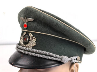 Reichswehr / frühe Wehrmacht, Schirmmütze für einen Offizier der Infanterie. Gestragenes Stück, Kopfgrösse 56