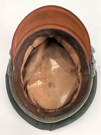 Reichswehr / frühe Wehrmacht, Schirmmütze für einen Offizier der Infanterie. Gestragenes Stück, Kopfgrösse 56