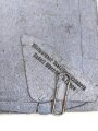 Eisernes Kreuz 2. Klasse 1939 mit Hersteller 100 im Bandring für " Rudolf Wächtler & Lange, Mittweida ", Hakenkreuz mit voller Schwärzung, Band und desolate Tüte beiliegend