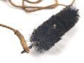 Reinigungsschnur mit Bürste für ein ziviles Reinigungsgerät. Durchmesser der Bürste etwa 20mm