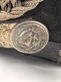 Bayern, Tschako für Landwehr Modell 1825. Der Deckel aus Blech, der silberne Kordon unvollständig. Innenfutter fehlt, sonst guter Gesamtzustand.