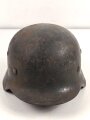 Luftwaffe, Stahlhelm Modell 1940. Originallack, ungereinigtes Stück, in allen Teilen original und zusammengehörig. hkp64