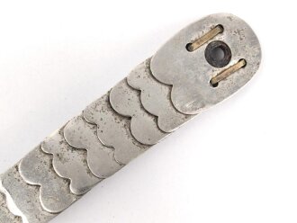Teil einer Schuppenkette für eine Pickelhaube....
