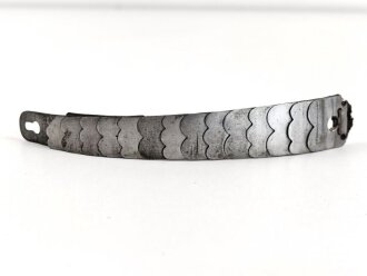 Teil einer Schuppenkette für eine Pickelhaube....