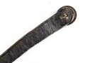 Teil einer Schuppenkette für eine Pickelhaube. Gesamtlänge 16cm, silbern