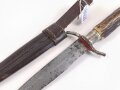 1.Weltkrieg  Grabendolch. Eigentumstück mit Hirschhorngriffschalen und Lederscheide. Guter Gesamtzustand
