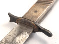 1.Weltkrieg  Grabendolch DEMAG Duisburg. Der Dolch in gutem Zustand mit Abnahme, Scheide original lackiert, das Leder defekt