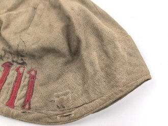 1.Weltkrieg, feldgrauer Überzug für eine Pickelhaube eines Angehörigen im Infanterie Regiment 111. Wendbare Ausführung , die andere Seite mit Manöverband. Deutlich getragenes Stück