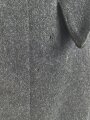 Uniformjacke dunkelblaugrau, erinnert vom Schnitt an Österreich, allerdings will der Kragen nicht dazu passen. Wenige kleinere Mottenschäden, sonst gut