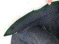 Uniformjacke dunkelblaugrau, erinnert vom Schnitt an Österreich, allerdings will der Kragen nicht dazu passen. Wenige kleinere Mottenschäden, sonst gut
