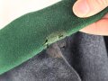 Uniformjacke dunkelblaugrau, erinnert vom Schnitt an Österreich, allerdings will der Kragen nicht dazu passen. Wenige kleinere Mottenschäden, sonst gut